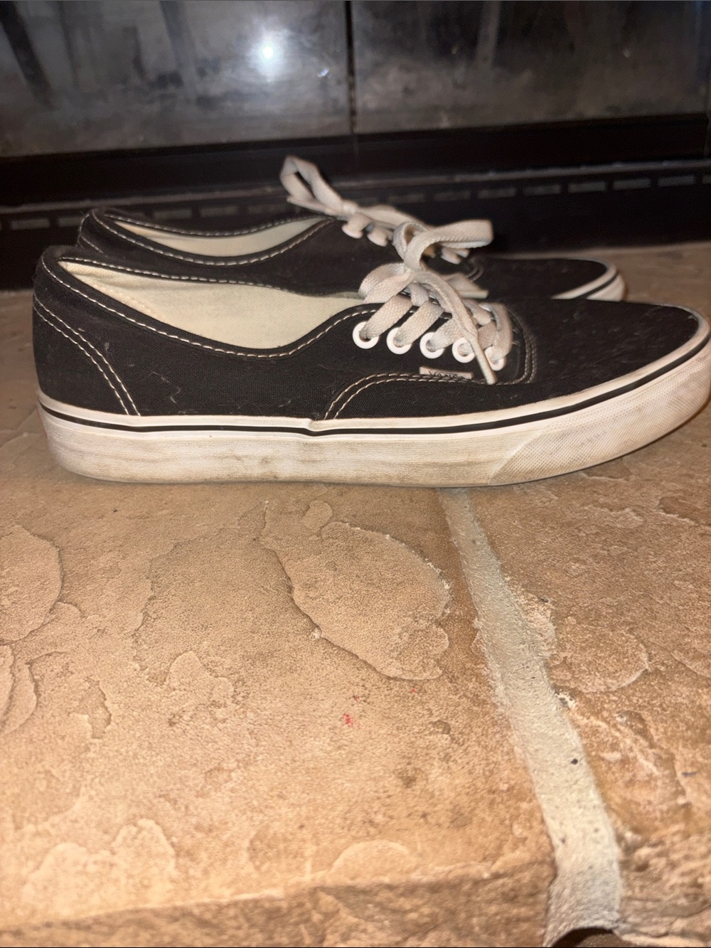Classic Black Low-Top Canvas Vans Sneakers with White Trim